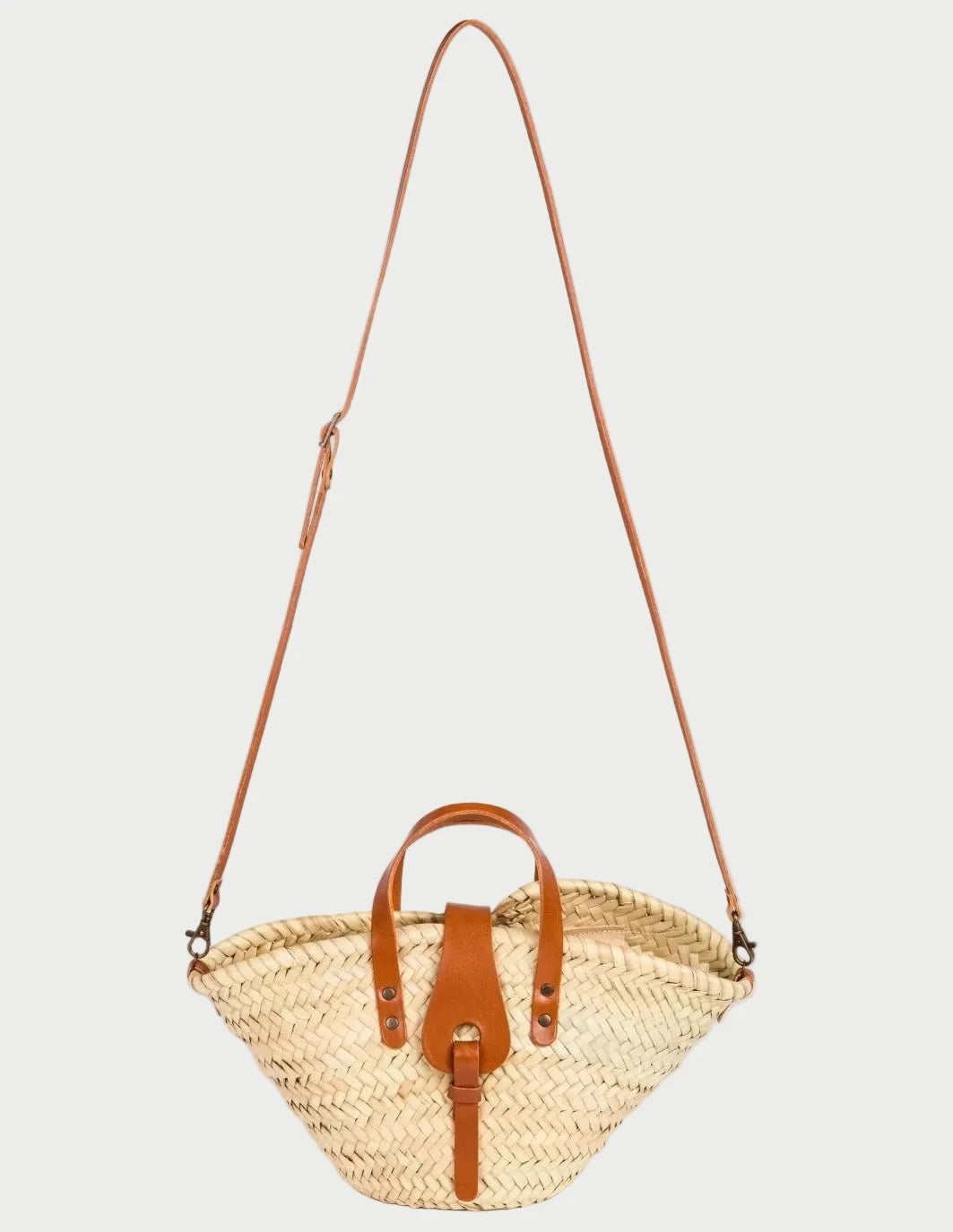 Zahira Mini handwoven palm leaf basket bag with light brown calfskin top handles and shoulder strap