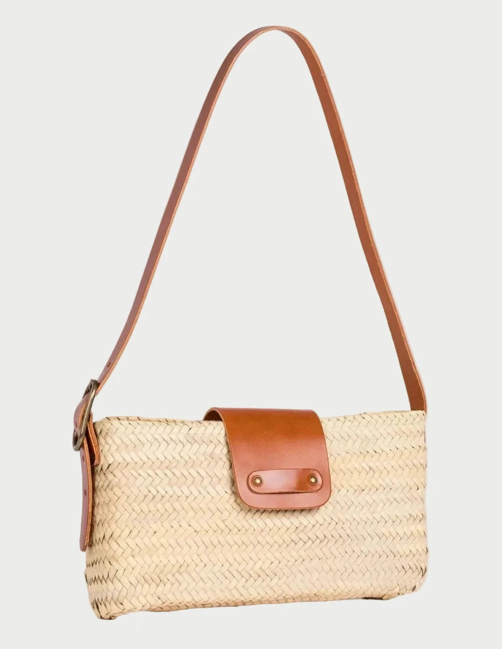 Asmae palm leaf baguette bag with light brown calfskin trim, front three-quarter angle