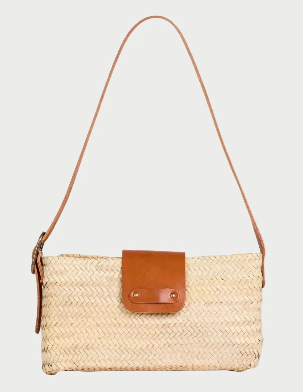 Asmae Baguette Bag in handwoven palm leaf with light brown calfskin strap and front flap, front view