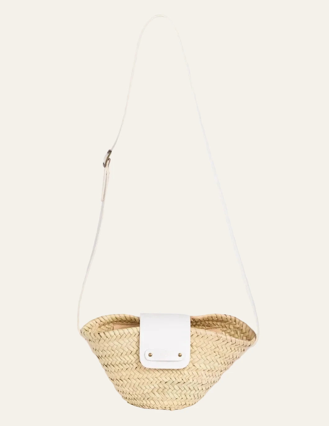Dija Crossbody palm leaf basket bag with white calfskin strap and flap, front view