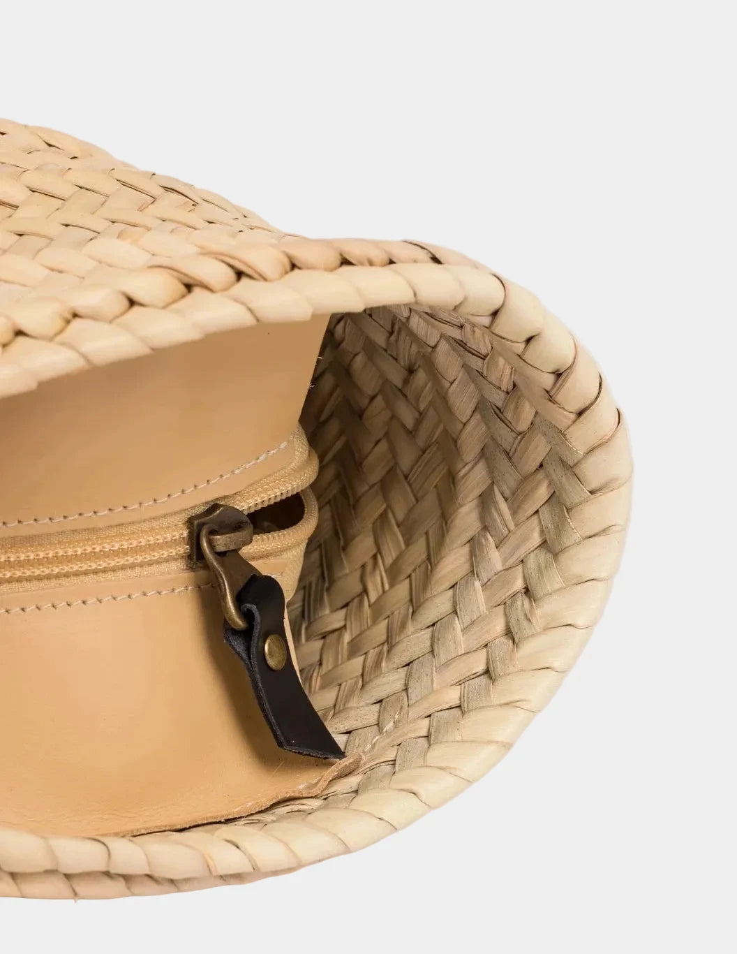 Inside view of the spacious Fadma Large palm leaf basket bag #color_black