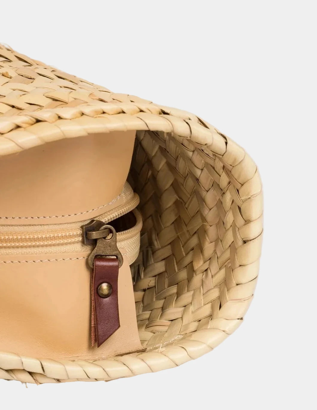 Inside view of the spacious Fadma Large palm leaf basket bag #color_dark brown