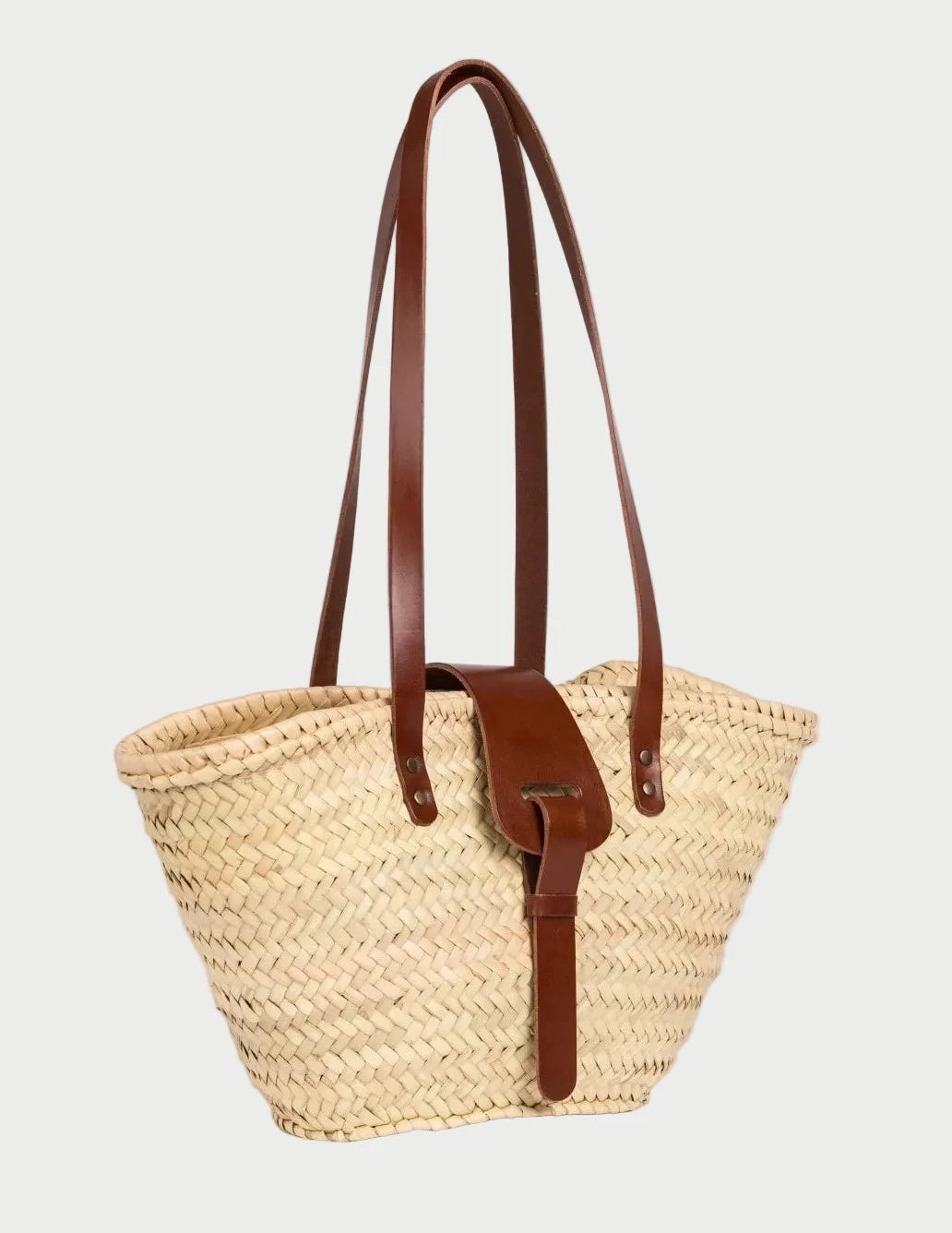 view of the Fadma Small palm leaf basket bag