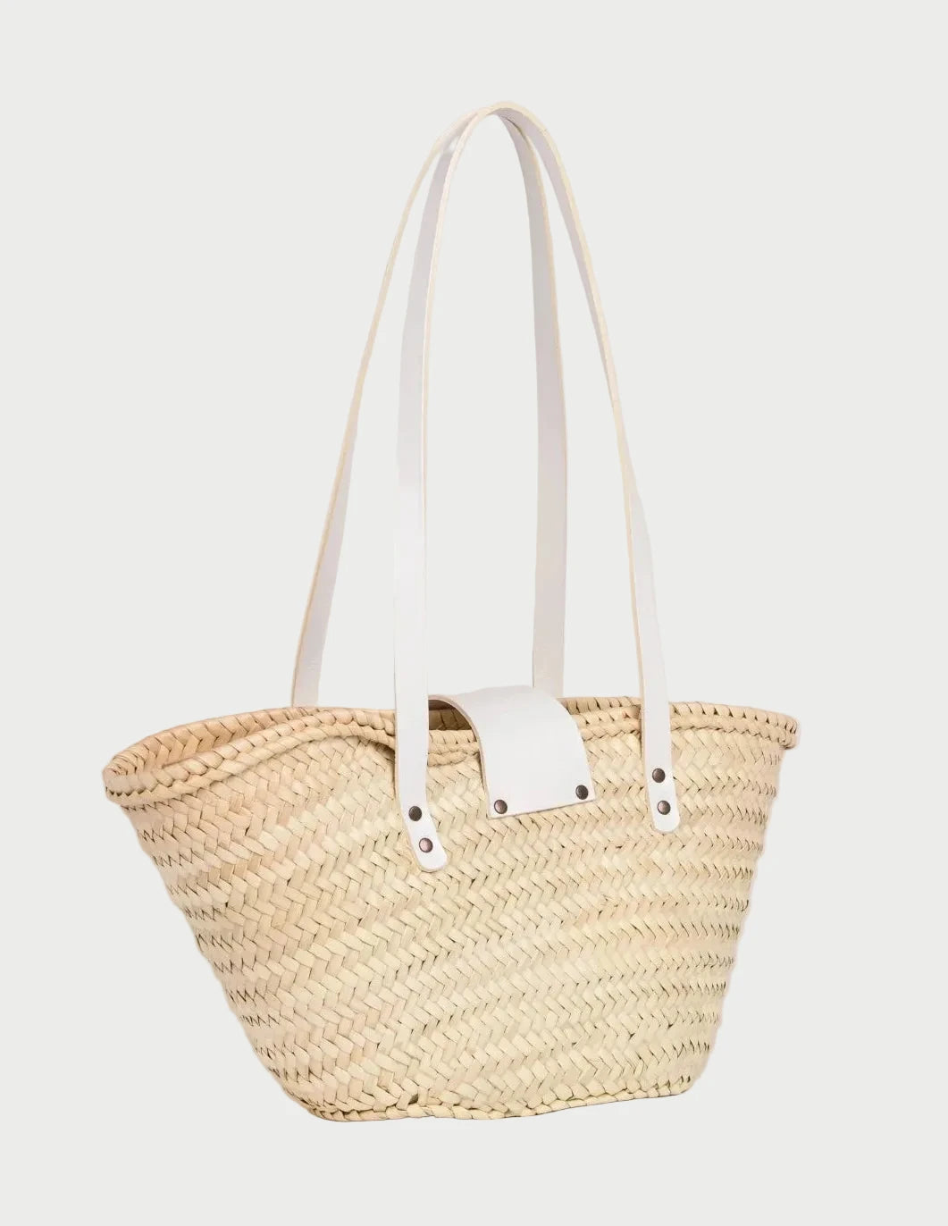 Back view of the Fadma Small palm leaf basket bag showing the woven doum palm
