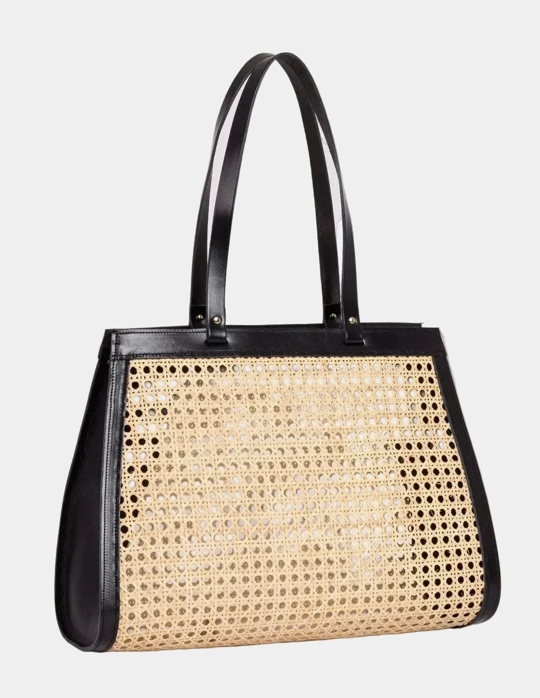 Lamia rattan cane tote with black leather trim, three-quarter angle #color_black