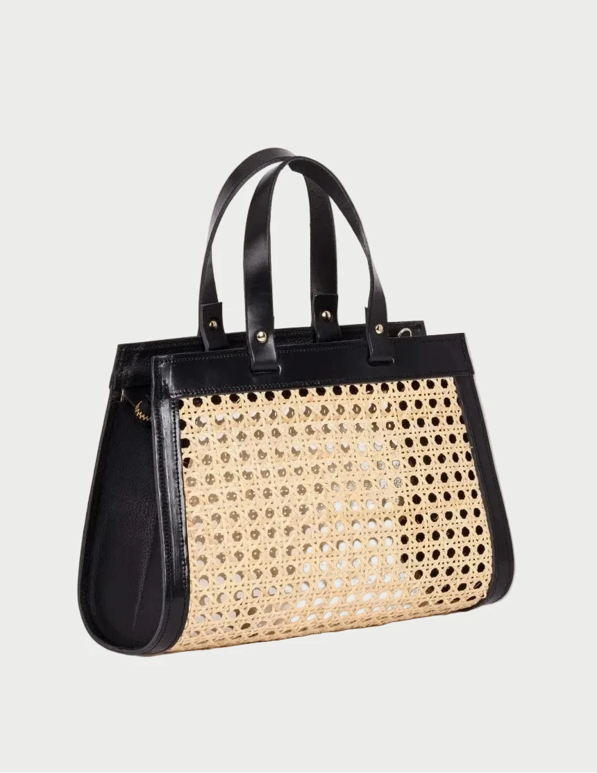 Lamia Mini rattan cane bag with black leather trim, three-quarter angle