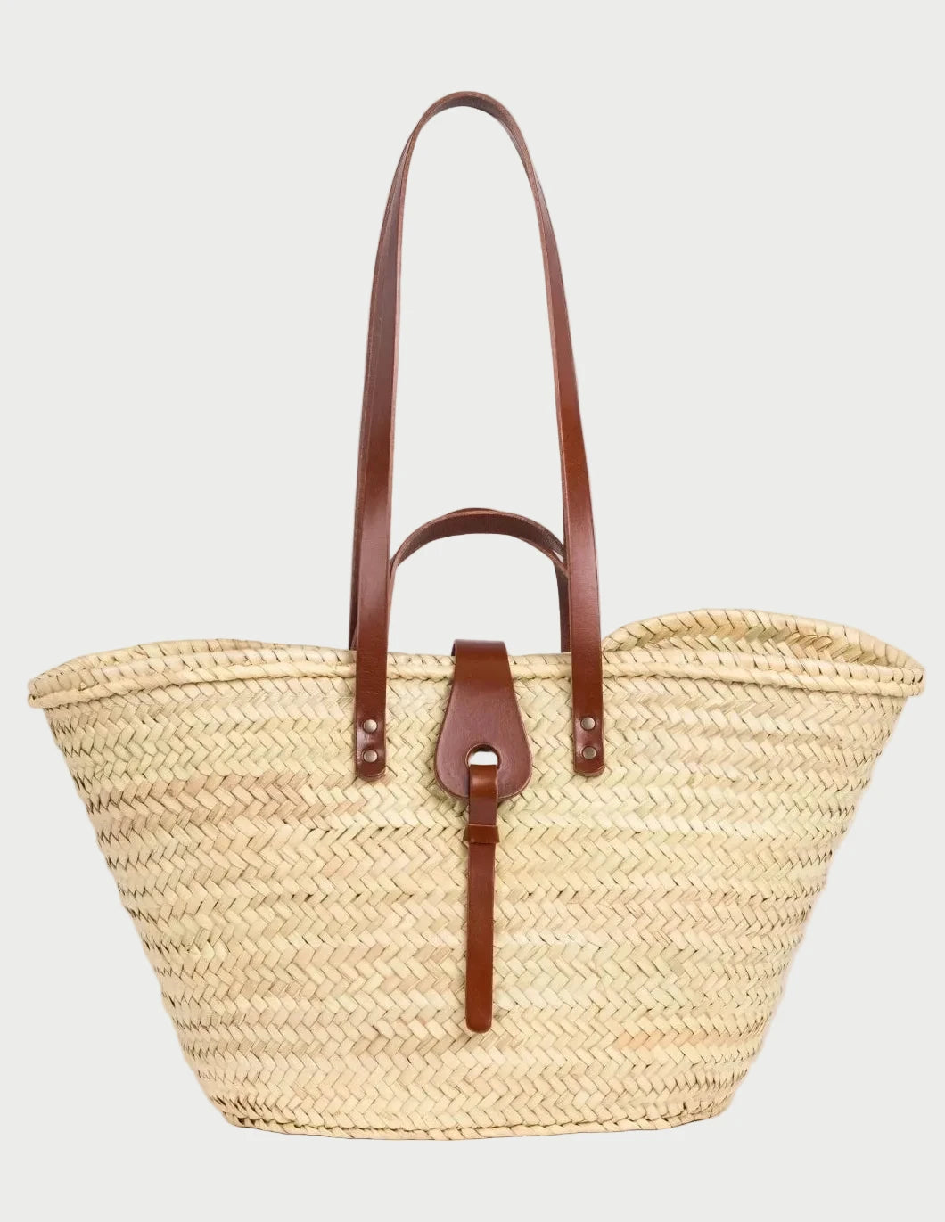 Zhour Large palm leaf basket bag with dark brown calfskin handles and shoulder straps, front view
