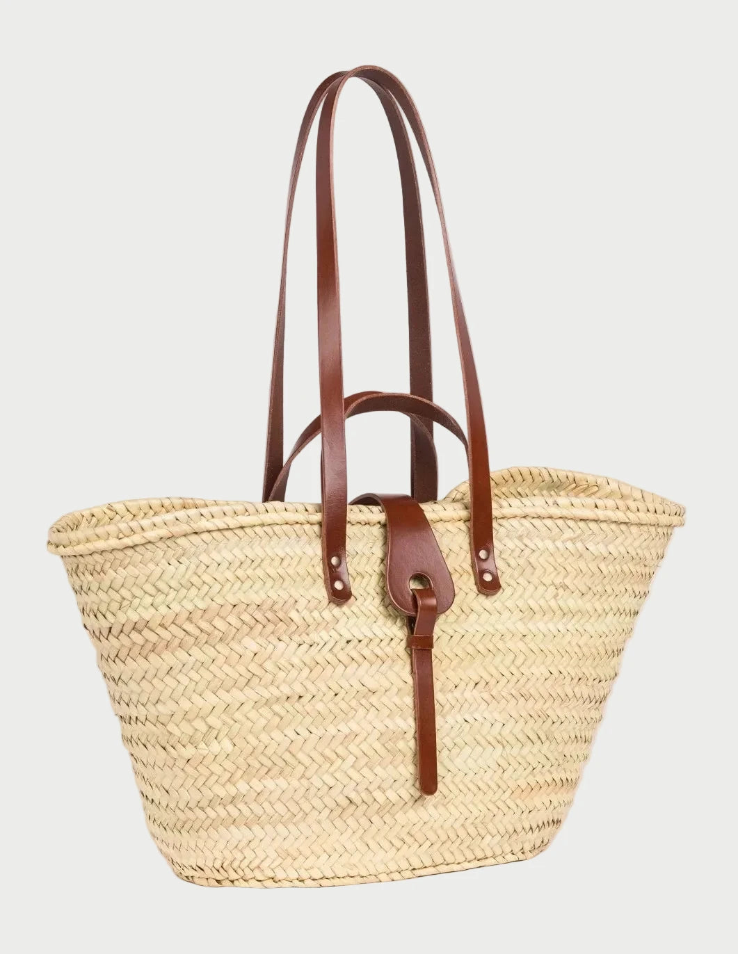 zhour Large palm leaf basket bag with dark brown calfskin handles and shoulder straps, front view