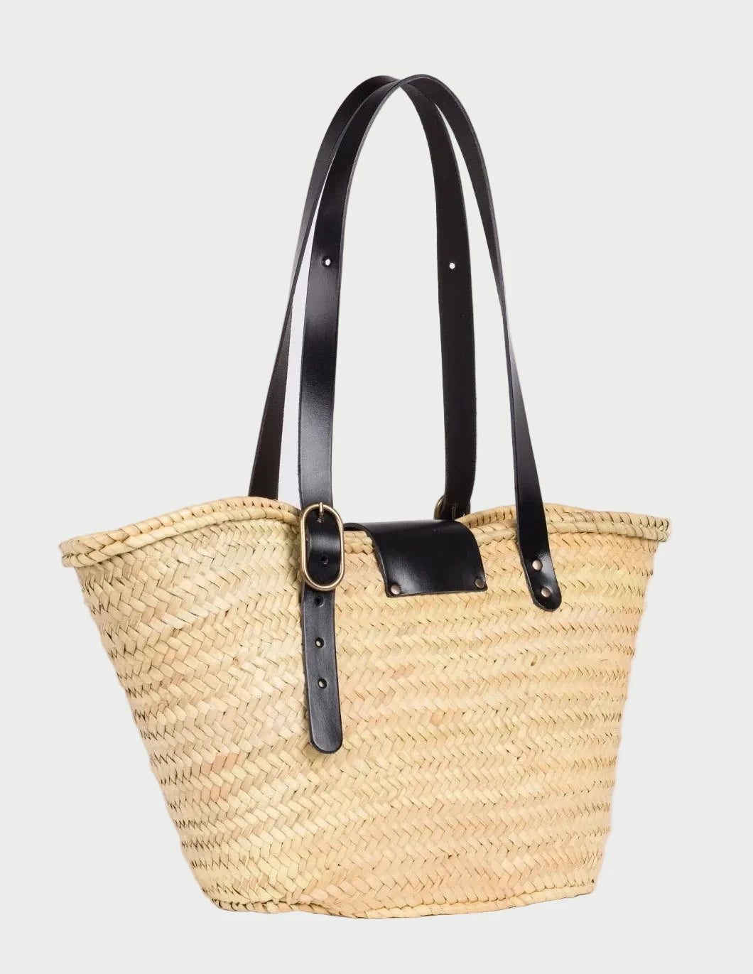 Back view of Aicha Moroccan palm leaf basket bag with black calfskin leather handles