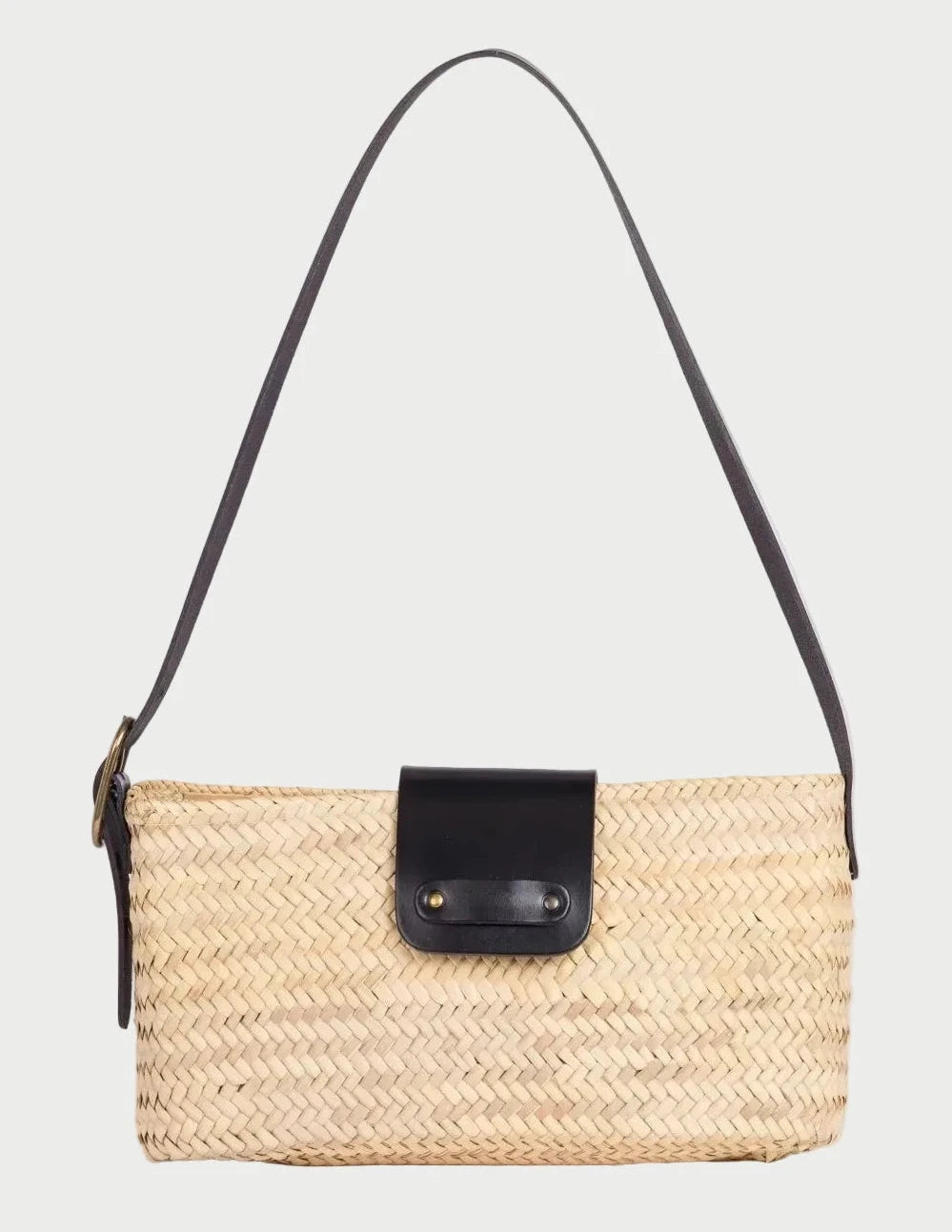 Asmae Baguette Bag in handwoven palm leaf with black calfskin strap and front flap, front view