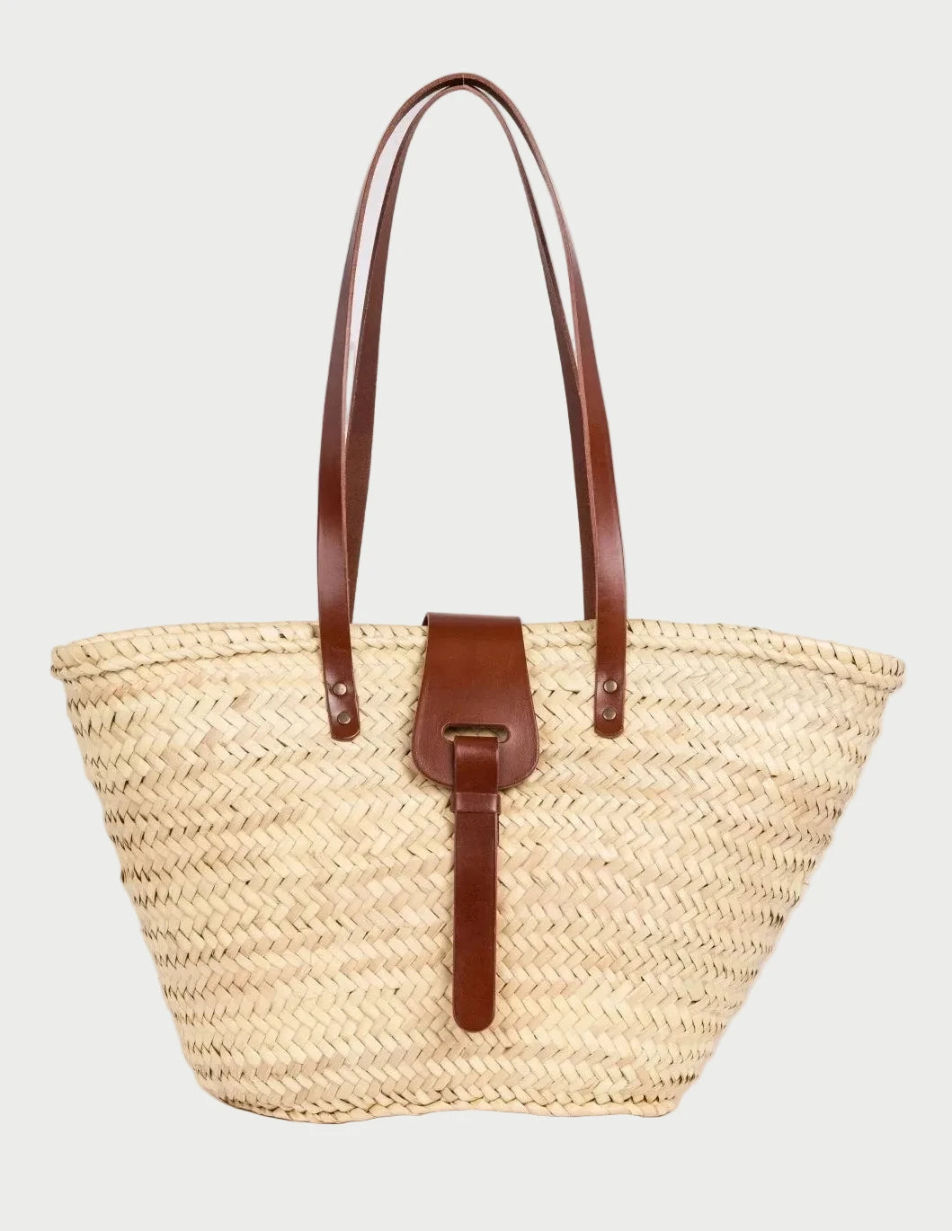 Fadma Large palm leaf basket bag with dark brown calfskin handles and shoulder straps, front view