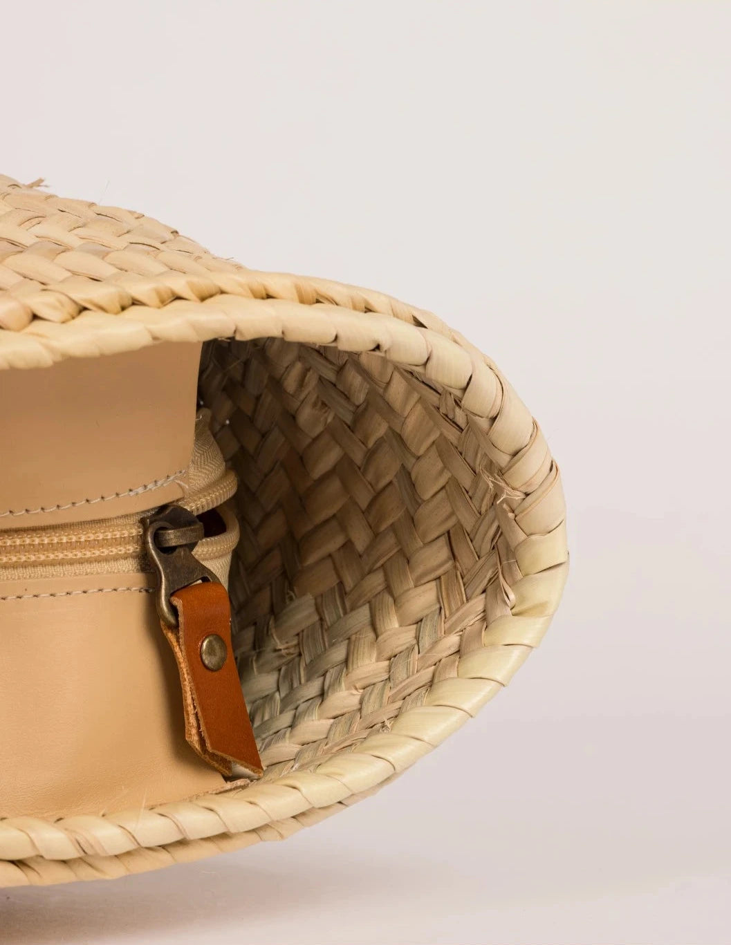 Inside view of the spacious Fadma Large palm leaf basket bag