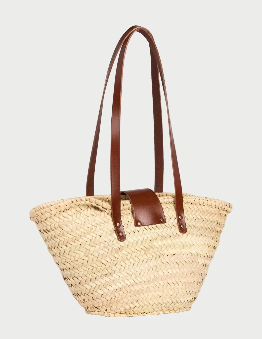 Back view of the Fadma Small palm leaf basket bag showing the woven doum palm