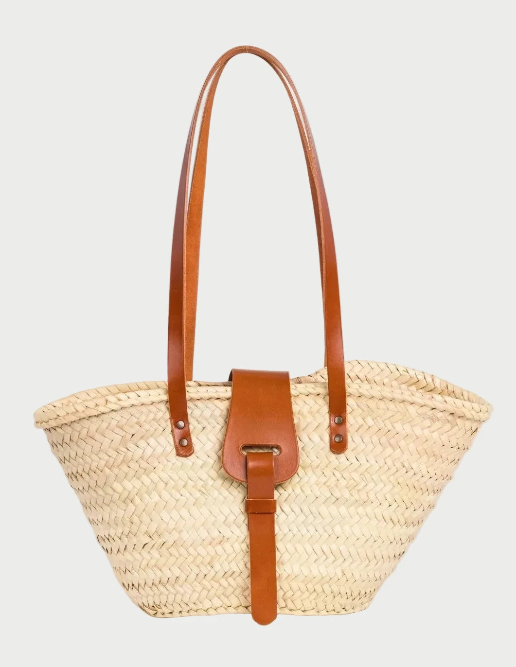 Fadma Small palm leaf basket bag with light brown calfskin handles and shoulder straps, front view