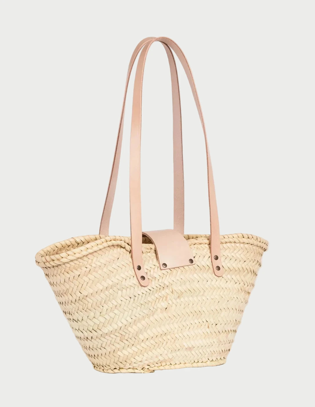 Back view of the Fadma Small palm leaf basket bag showing the woven doum palm