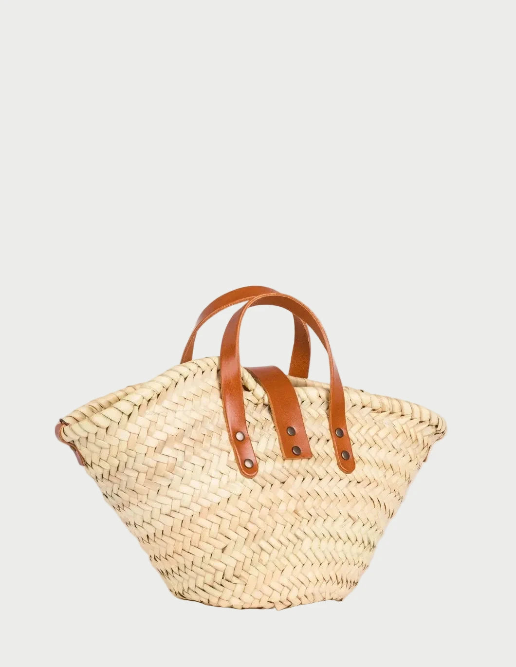 Zahira Mini handwoven palm leaf basket bag with light brown calfskin top handles back side 