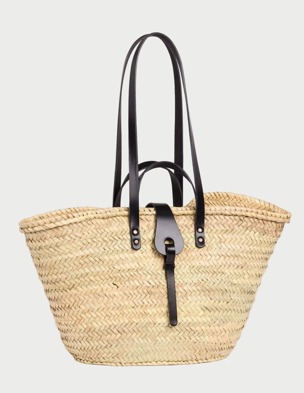 Side view of the Zhour Large basket bag in palm leaf with black calfskin straps