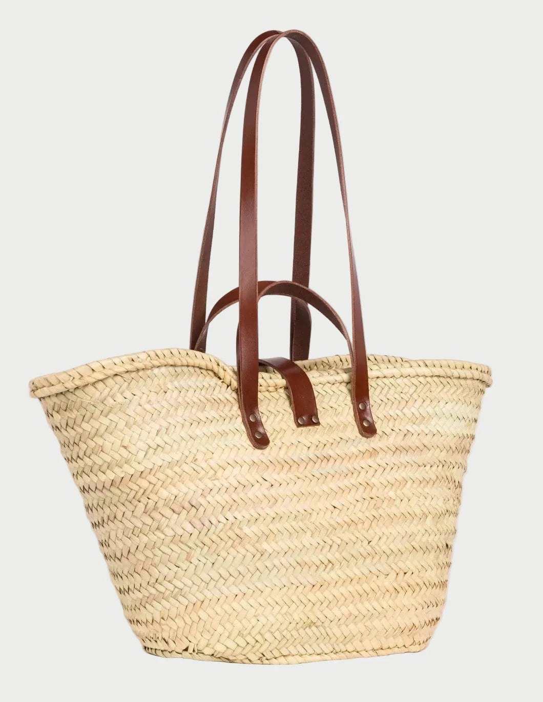 Back view of the Zhour Large palm leaf basket bag showing the woven doum palm