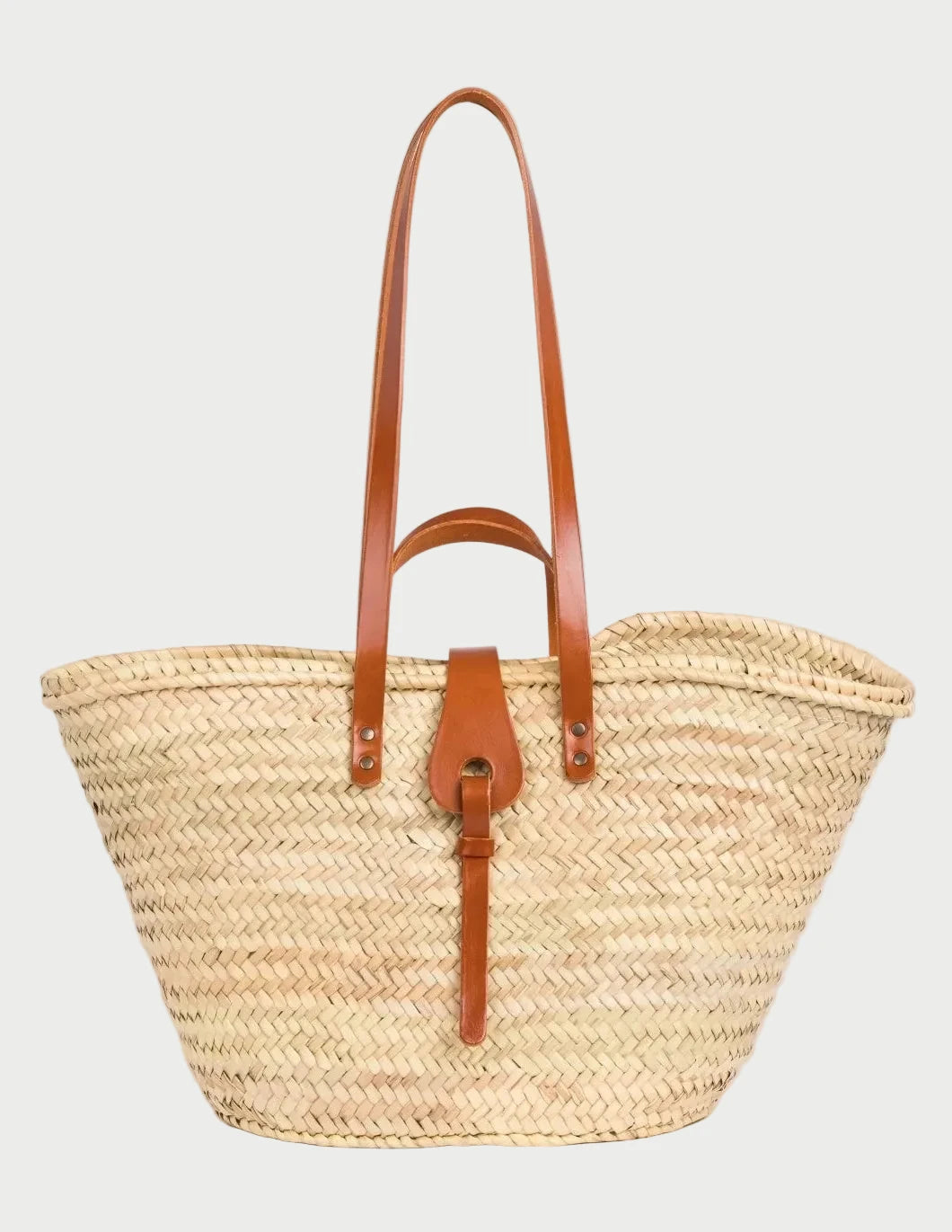 Zhour Large palm leaf basket bag with light brown calfskin handles and shoulder straps, front view